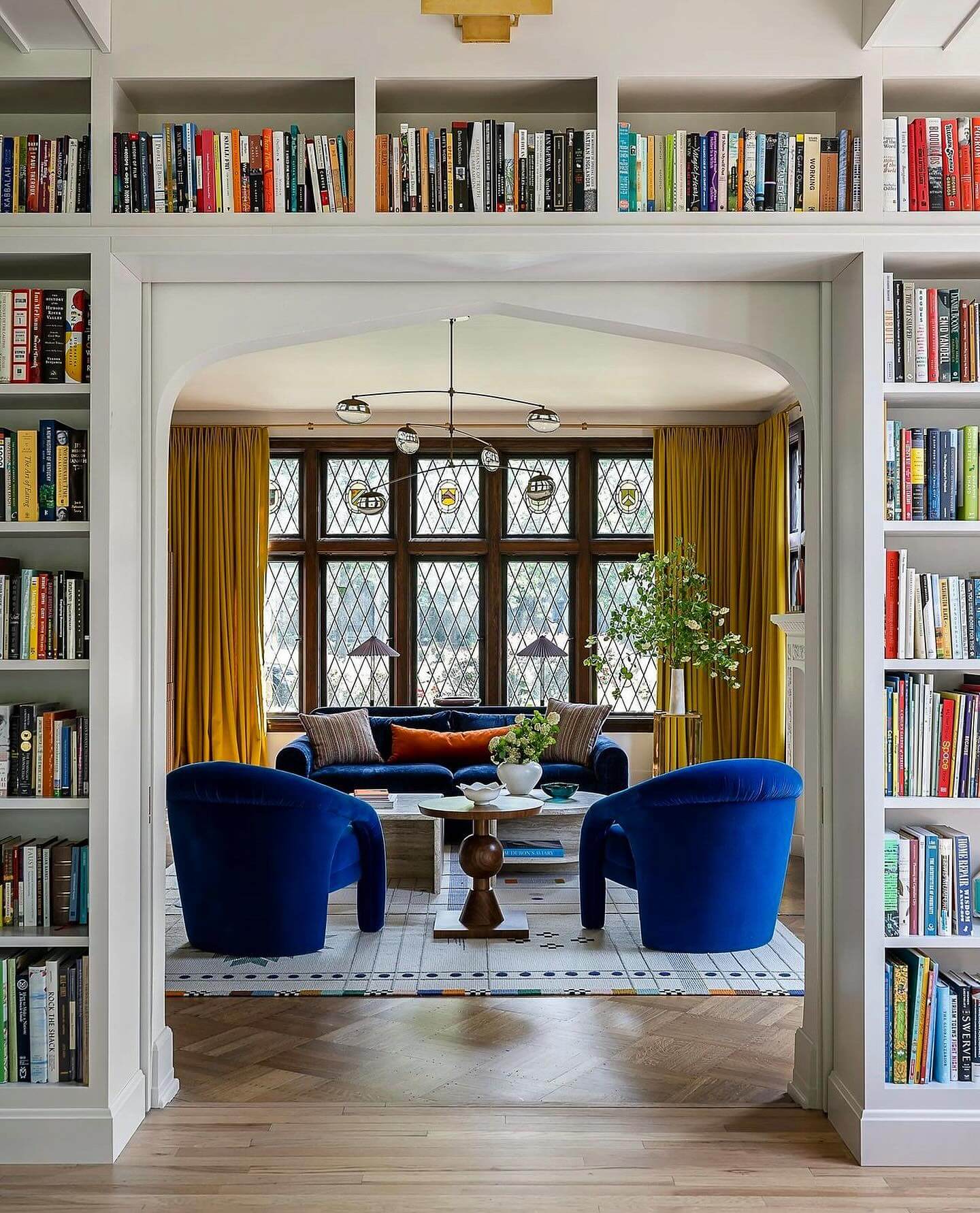 Sophisticated Entryway with a Stylish White Bookshelf