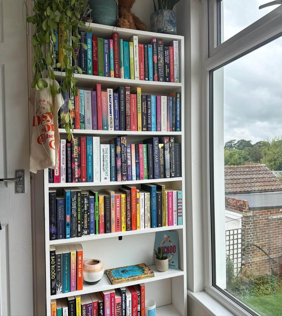 Airy Bookshelf Design with a Touch of Greenery