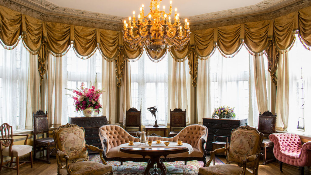 brown wooden frame with brown fabric padded sofa set