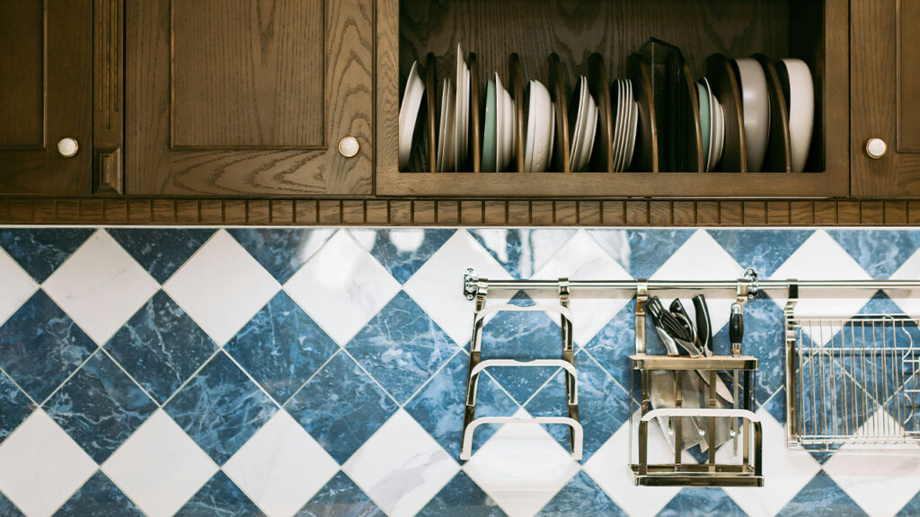 organized plate in kitchen cupboard