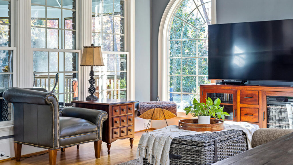 Gray Sofa beside Brown Wooden Chest of Drawers