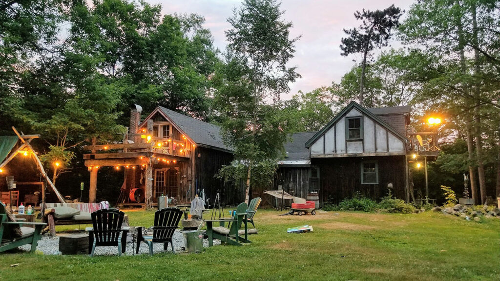 turned-on lights outside houses