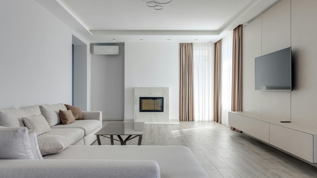 Spacious lounge room with soft furniture