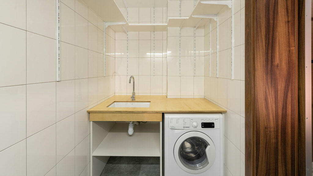 White Washing Machine Under the Table