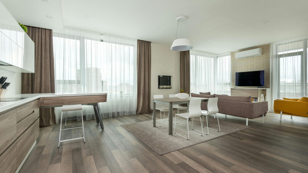 Spacious living room with dining area and kitchen