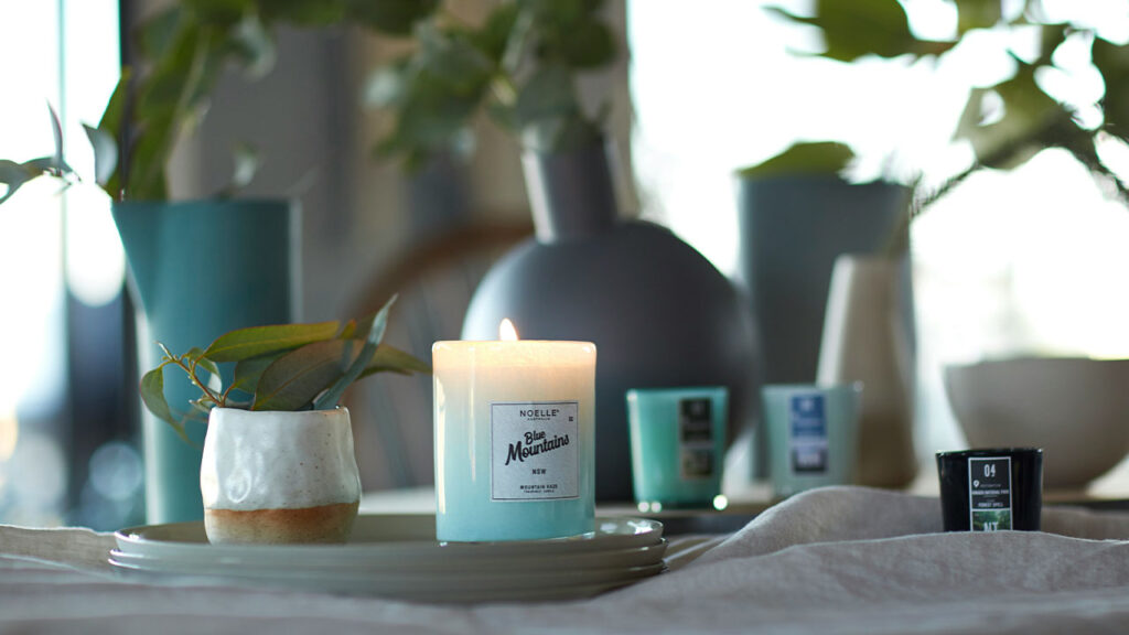 glass candle holder on ceramic plate