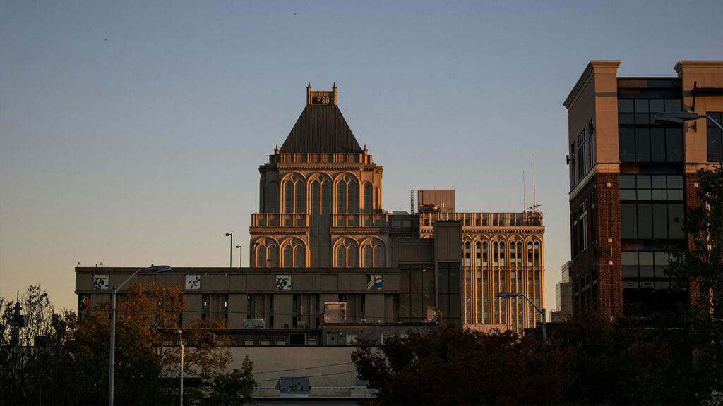 brown concrete building at sunrise