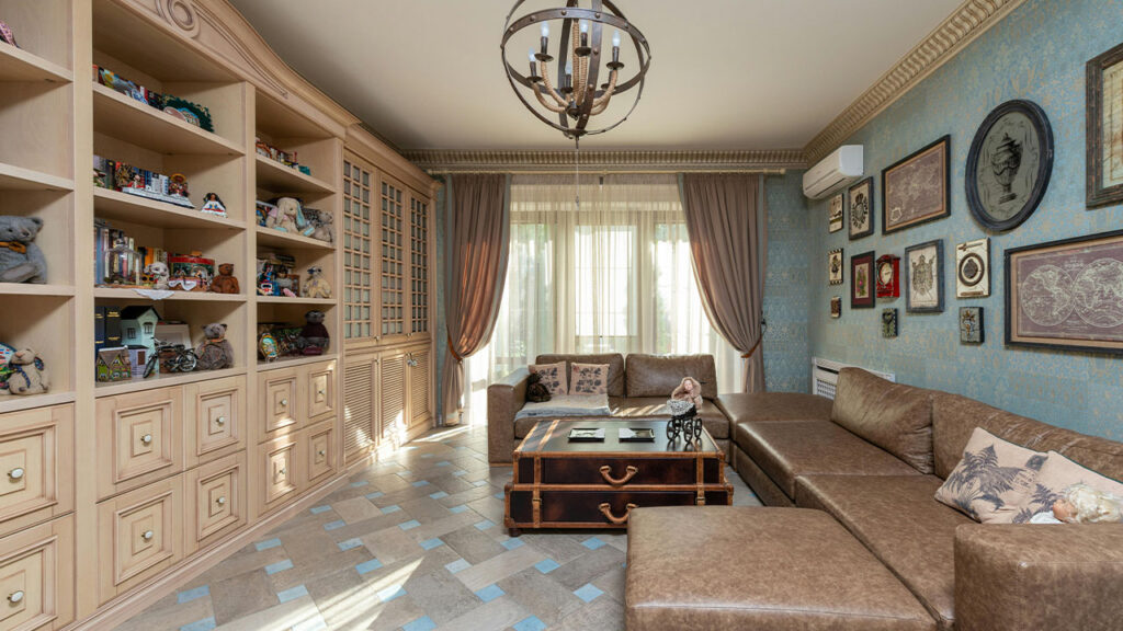 A Large Couch in Front of a Wall Cabinet