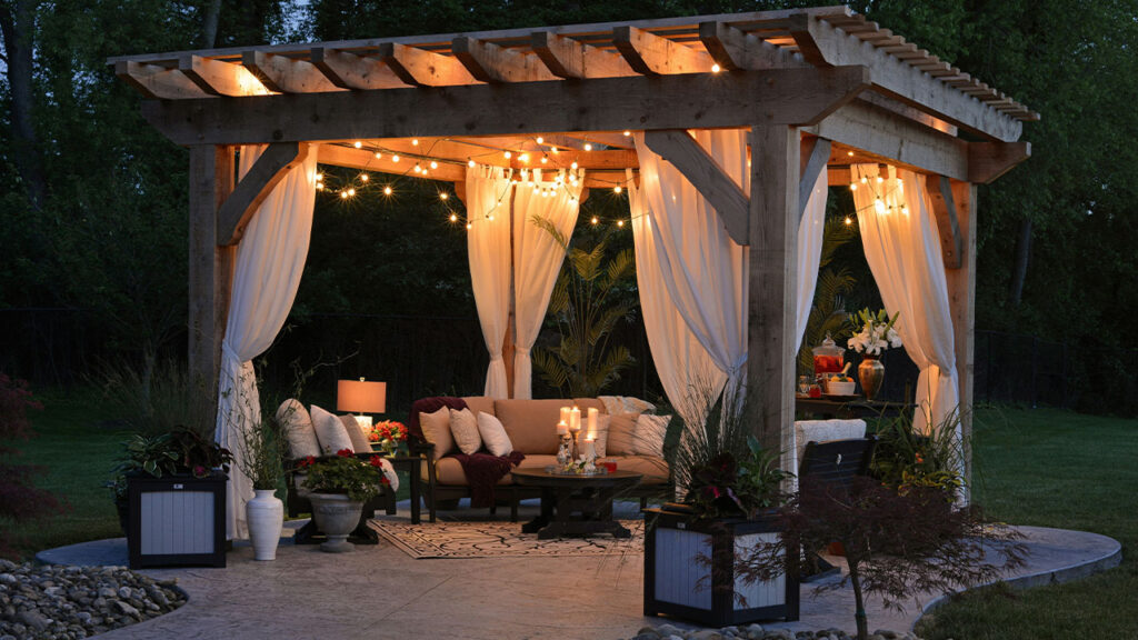 photo of gazebo with curtain and string lights