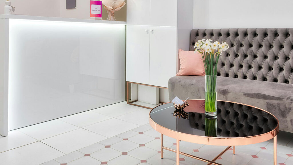 Modern lobby interior with furniture and decorative lamps