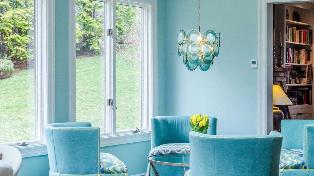 blue and gray padded armchairs