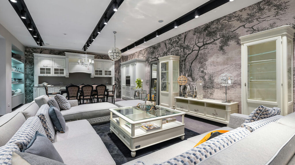 Couch near table and kitchen counter