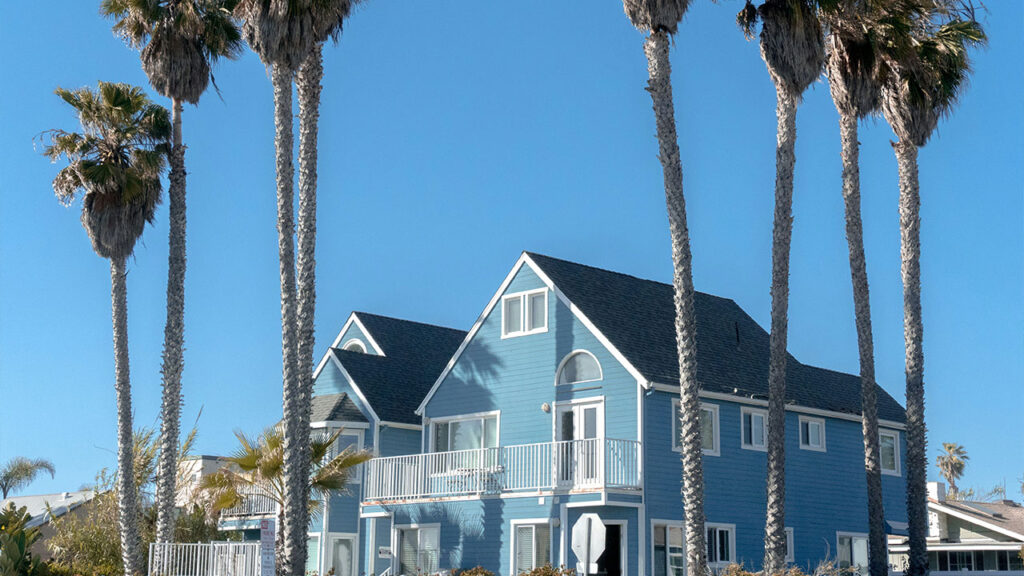 blue and white house at daytime