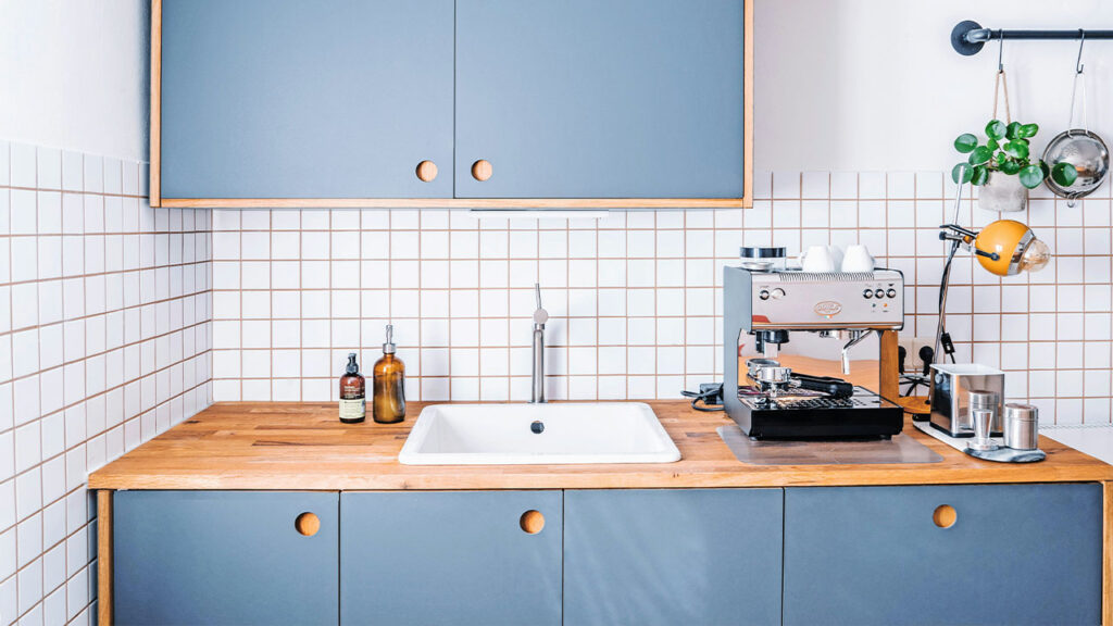 white ceramic sink with faucet