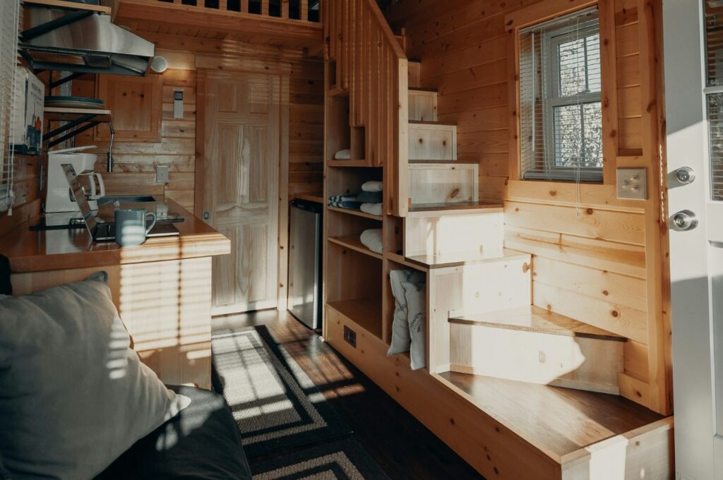 Interior of a tiny home with stairs.