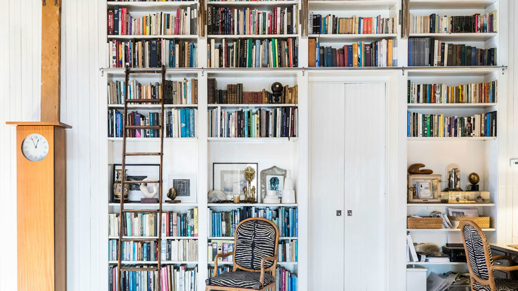 white wooden 4-layer shelf