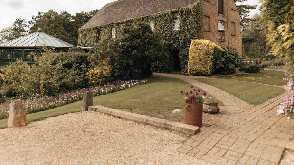 A house with a garden in front of it