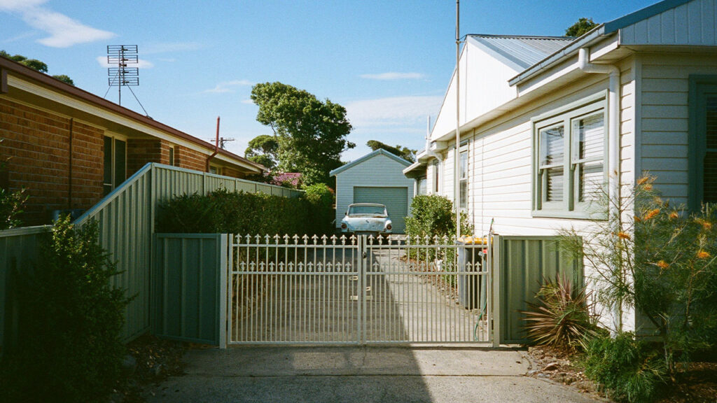 a house with a gate in front of it