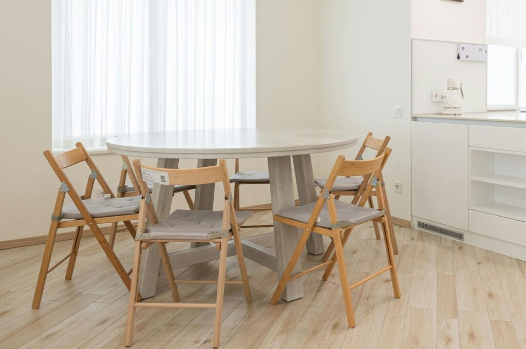 Dining table with wood flooring