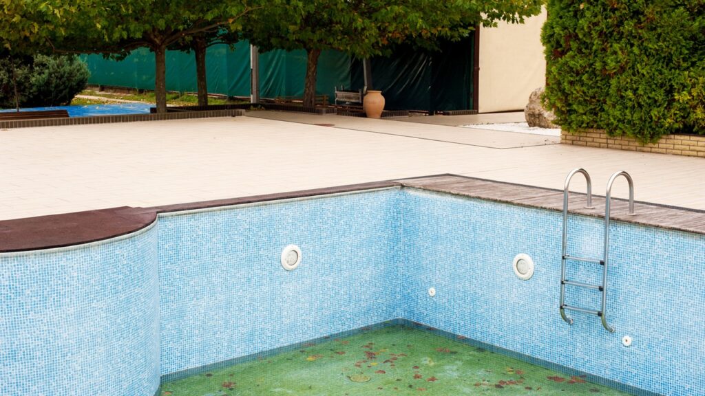 Empty swim pool on hotel territory in summer