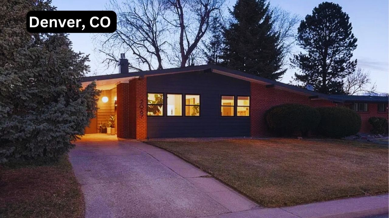 A mid-century modern home in Denver, CO, with a brick and dark-paneled exterior, large