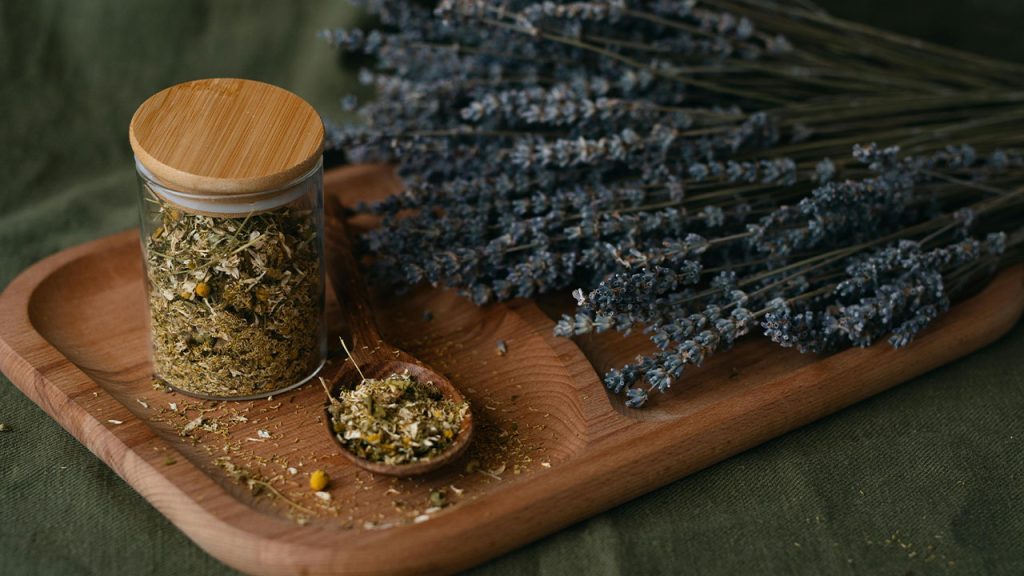Lavender Flowers and Herbs on Wooden Board