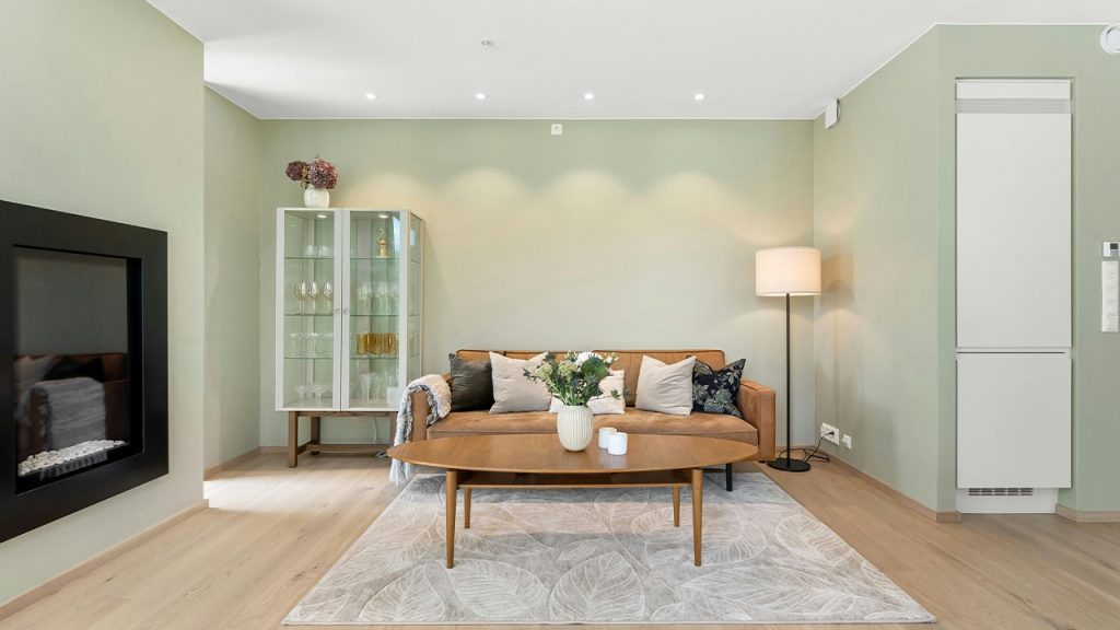 A living room filled with furniture and a flat screen TV