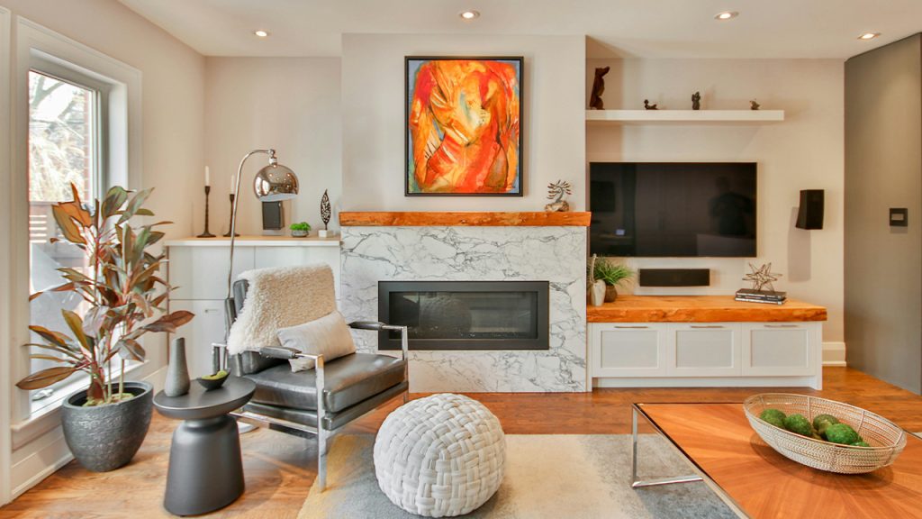 
a living room filled with furniture and a fire place
