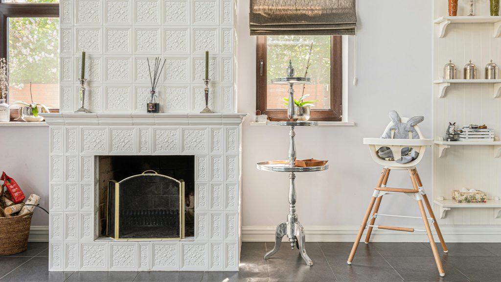 Brown Wooden Baby Chair Near Fireplace