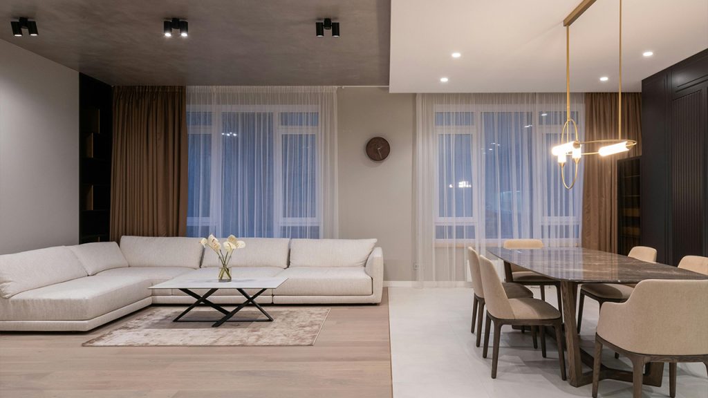 House with couch near table with chairs