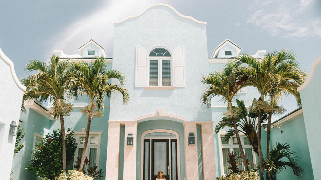 woman sitting in front of building