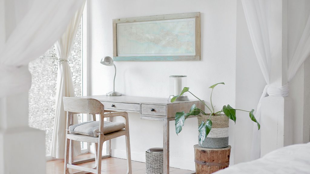 empty desk near curtain