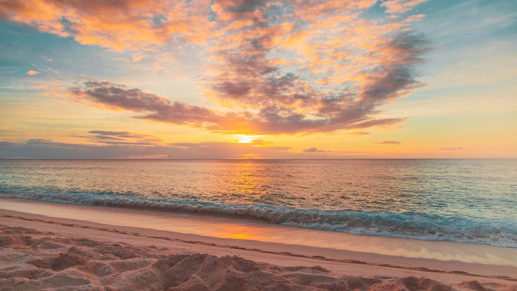 Sea Waves Crashing on Shore during Sunset