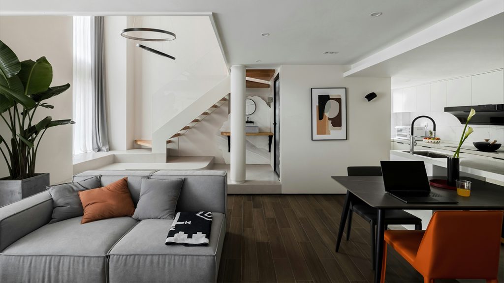 black wooden coffee table near white couch