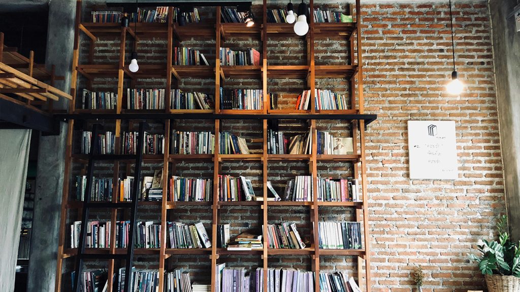 overloaded bookshelves