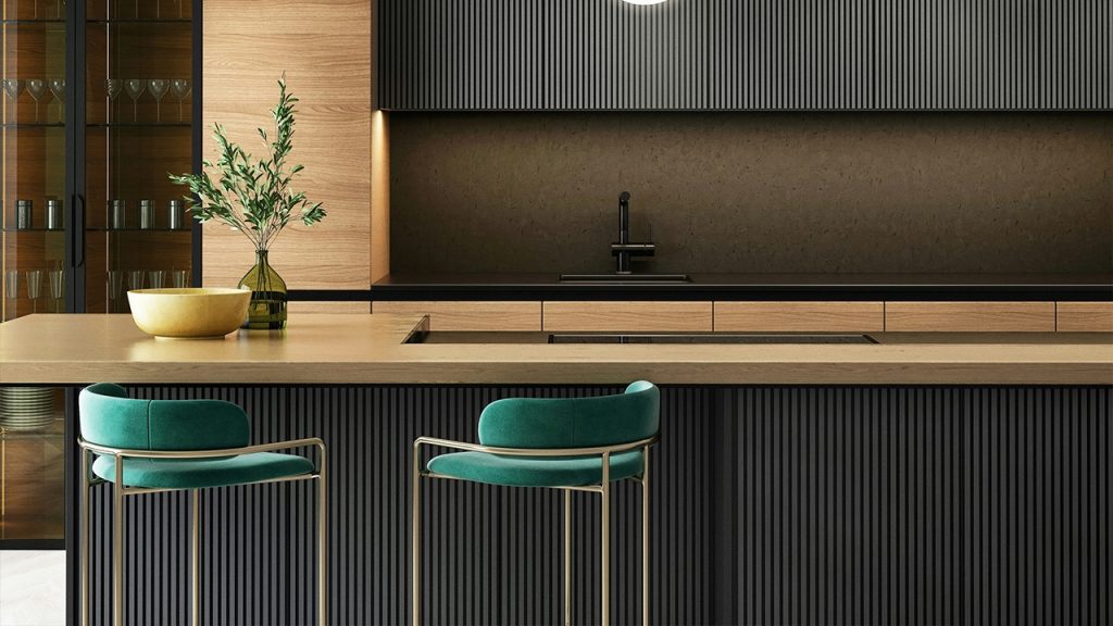 a modern kitchen with a bar and stools