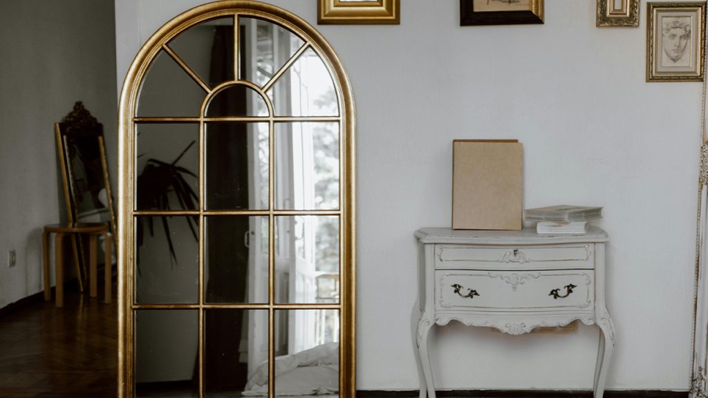 White Wooden Cabinet Beside White Wall