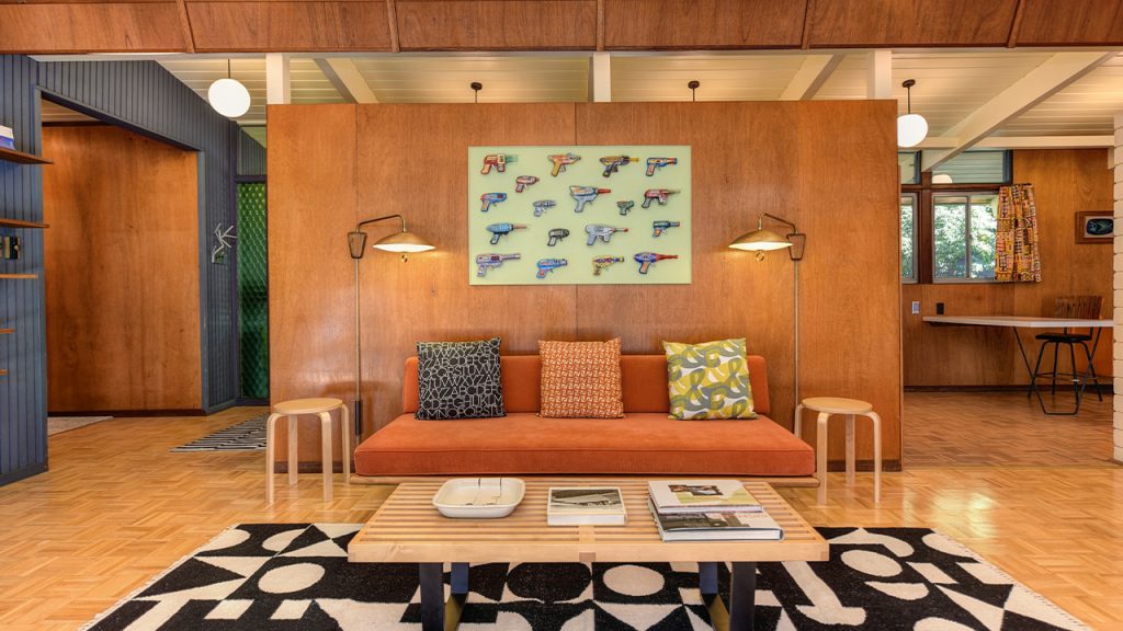 a living room with a couch and a table