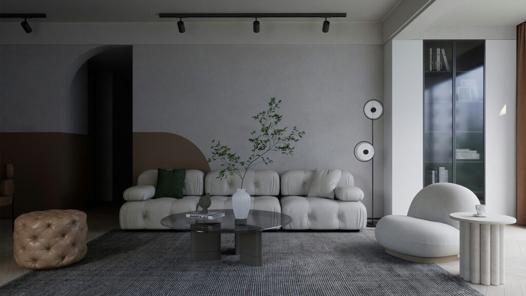 a living room with a couch, chair, table and speakers