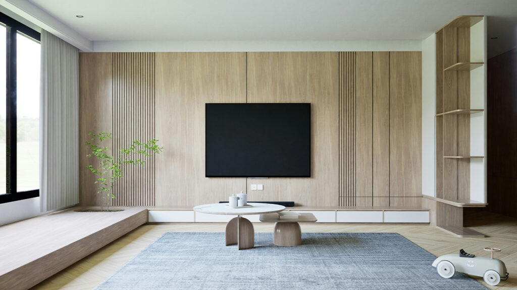 a living room with a television and a large window
