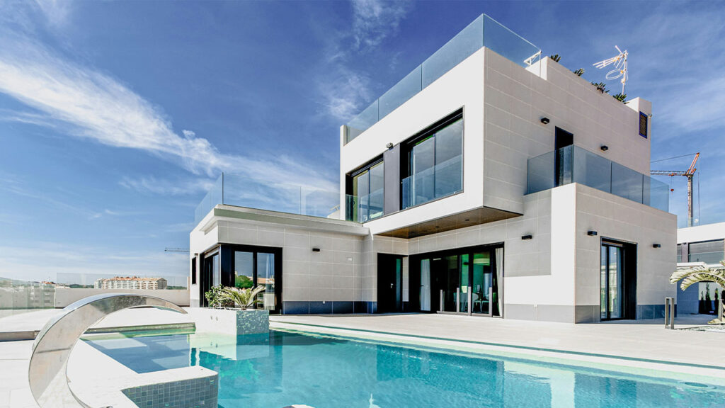 white concrete building under blue sky during daytime
