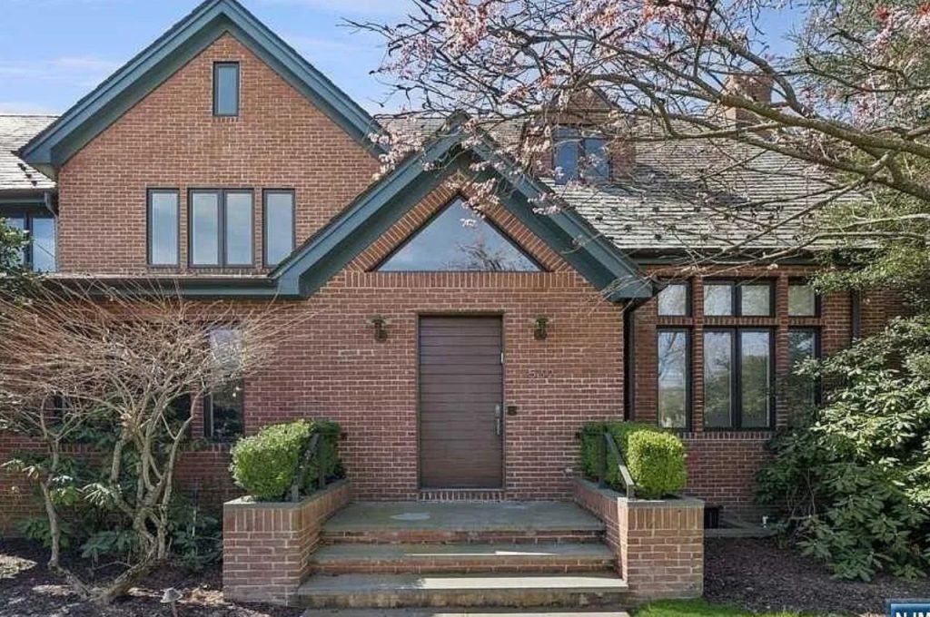 Elegant Brick Tudor Revival