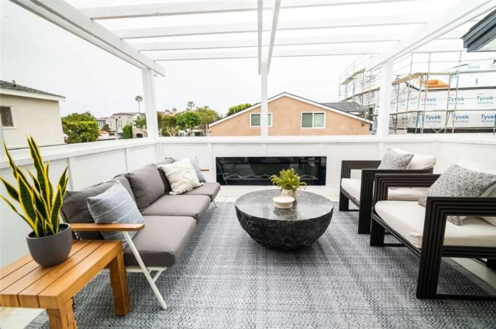 Modern Balcony with a Fireplace