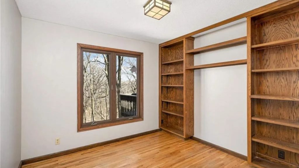 Cozy Bedroom with Built-In Bookshelves