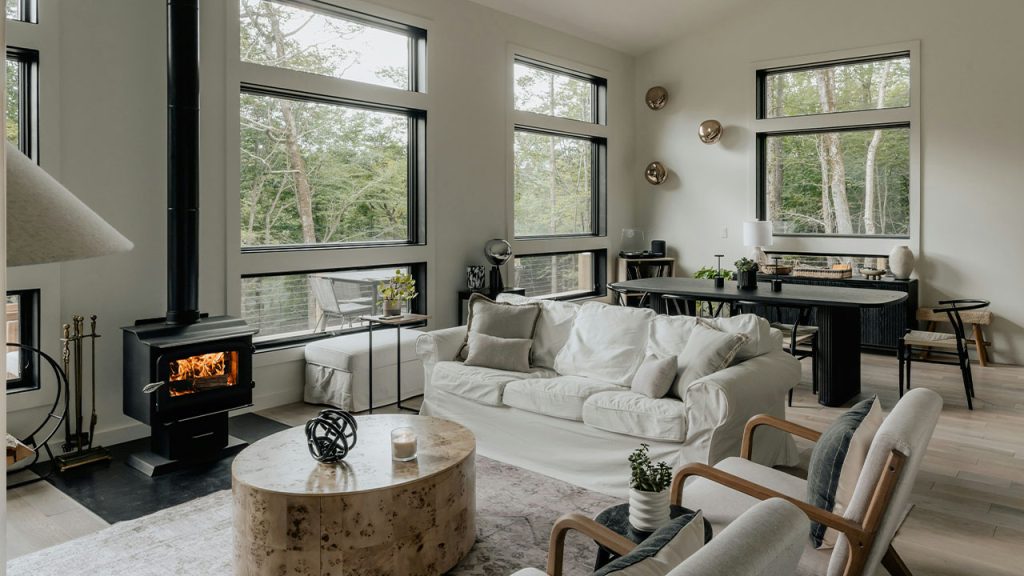 A living room filled with furniture and a fire place