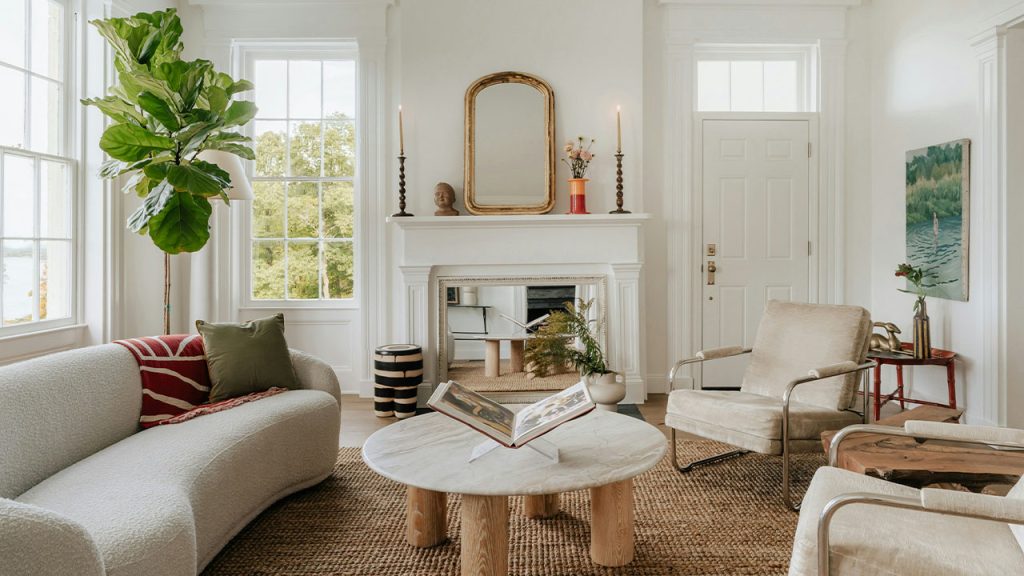 A living room filled with furniture and a fire place
