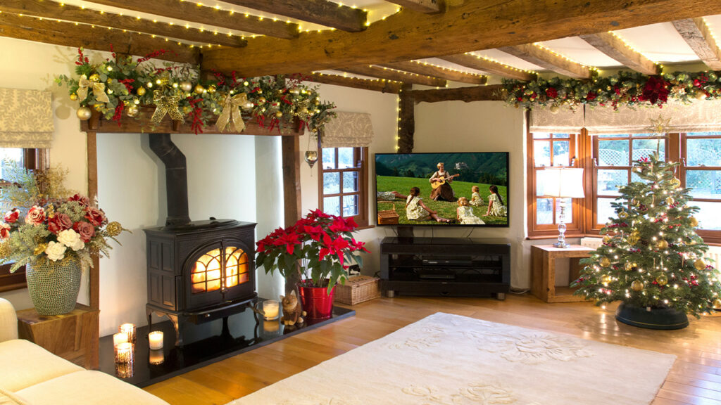 a living room filled with furniture and a fire place