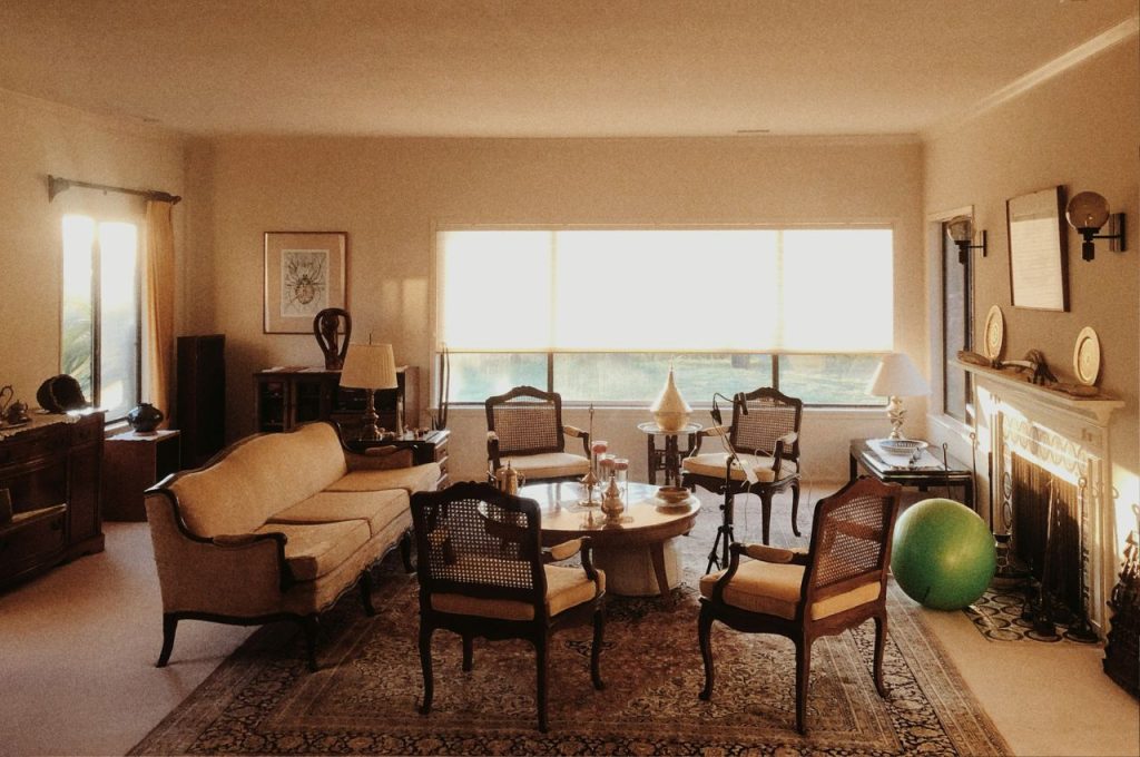 A living room with wooden furniture.