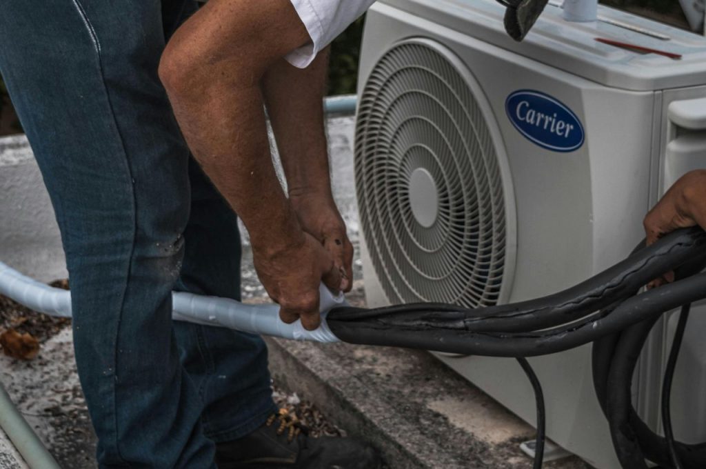 Repairing a damaged HVAC system.