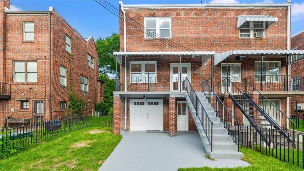 Brick Exterior with Balcony & Garage